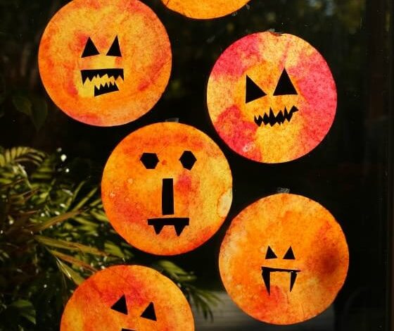 Easy Pumpkin Sun Catchers made with coffee filters and liquid watercolors Easy Pumpkin Sun Catchers made with coffee filters and liquid watercolors