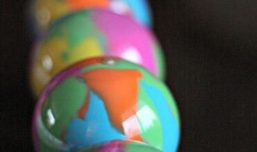 Pour-Painted Christmas Ornaments With Clear Ornaments