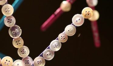 Snowflake Ornaments with craft sticks and buttons Snowflake Ornaments with craft sticks and buttons