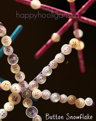 Snowflake Ornaments with craft sticks and buttons Snowflake Ornaments with craft sticks and buttons